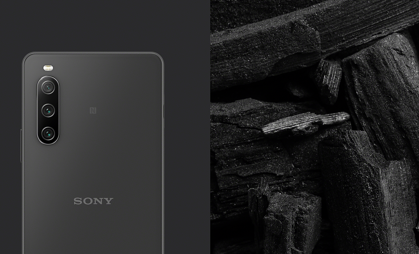 The Xperia 10 IV in black alongside an image of black charcoal