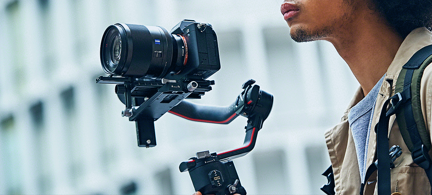 Someone using a Sony Alpha series camera for videography