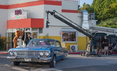 Image of a woman trying to get into a car