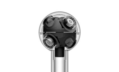 Illustrative cutaway of the ECM-AX10 microphone head showing internal multi-directional spherical capsules inside a clear shell.