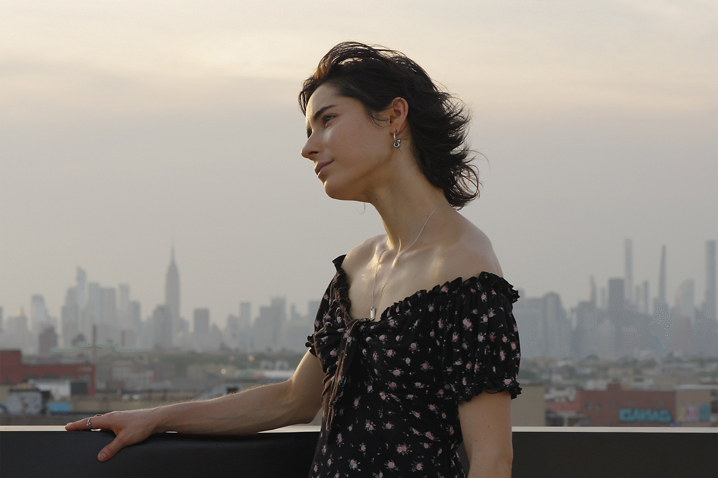  Image of a woman with a city background