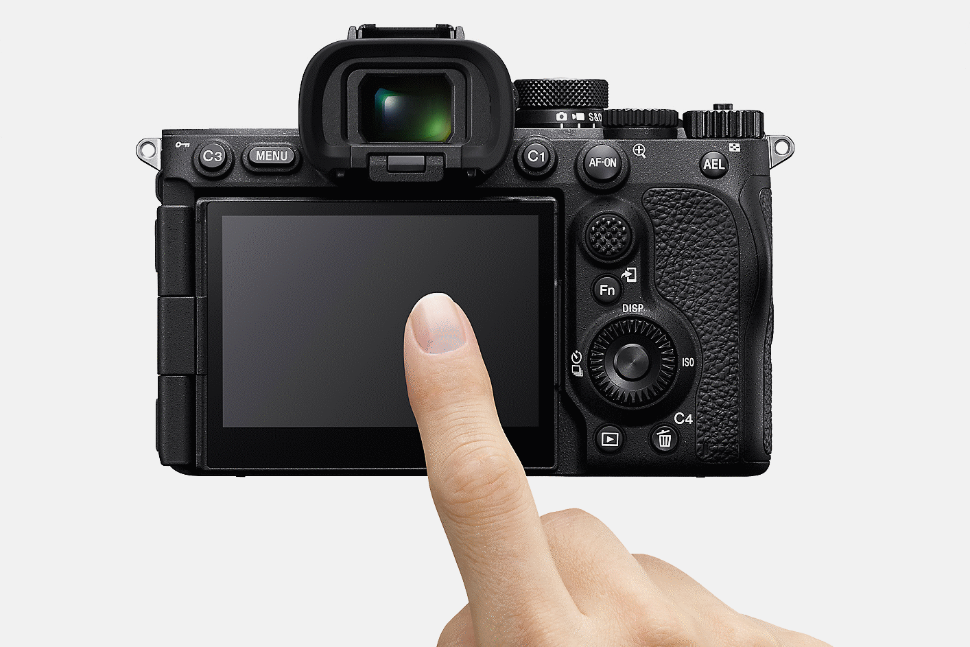 Imagem do painel LCD da câmara e de um dedo a tocar no mesmo