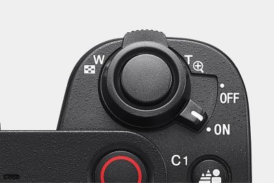 Imagen en primer plano de la palanca de zoom en el cuerpo de la cámara