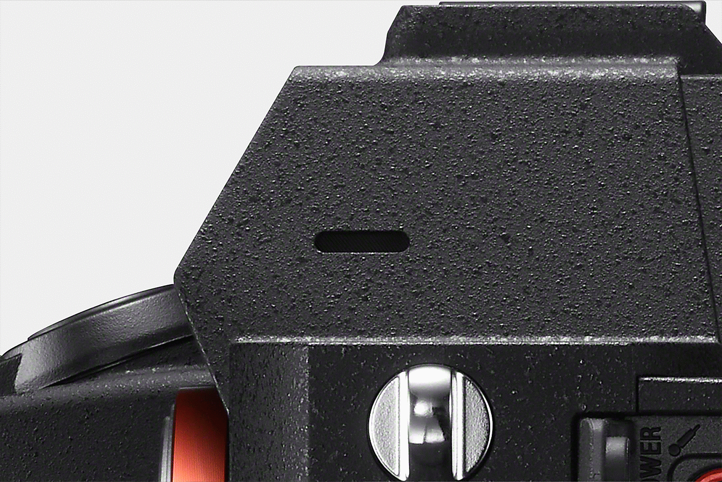 A close-up of the camera's internal microphone