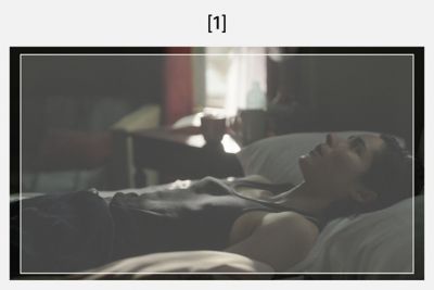 Image of a woman lying on a bed