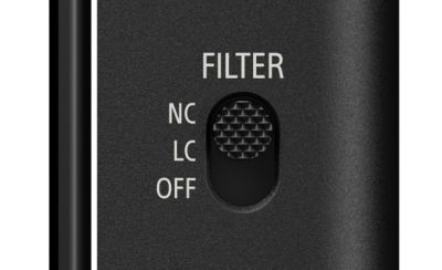 Close-up of the ECM-AX10 filter switch with a textured slider positioned between "NC", "LC", and "OFF" settings.