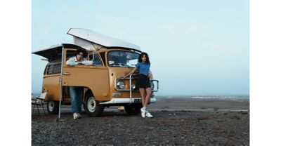 Image of woman standing in front of a van in FL (Film) mode