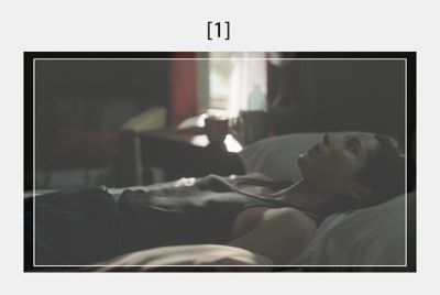 Image of a woman lying on a bed