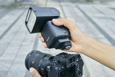 Image of metal shoe foot with rugged side frame under the flash