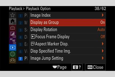 Imagen de la pantalla de menú de reproducción de fotos con la opción "Visualización agrupada" seleccionada