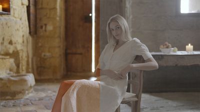 Imagen de ejemplo del retrato de una mujer sentada, con curva gamma S-Log3