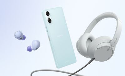 An Xperia 10 VI handset in blue along with a pair of wired headphones and a pair of wireless earbuds.
