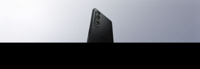 Image of Black Xperia 1 VI stood up showing it's 3 lenses. 