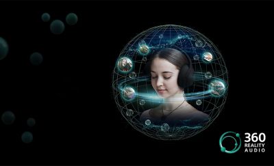 A young person surrounded by music in small orbs, to showcase the 360 Reality Audio experience of the ULT WEAR headphones.