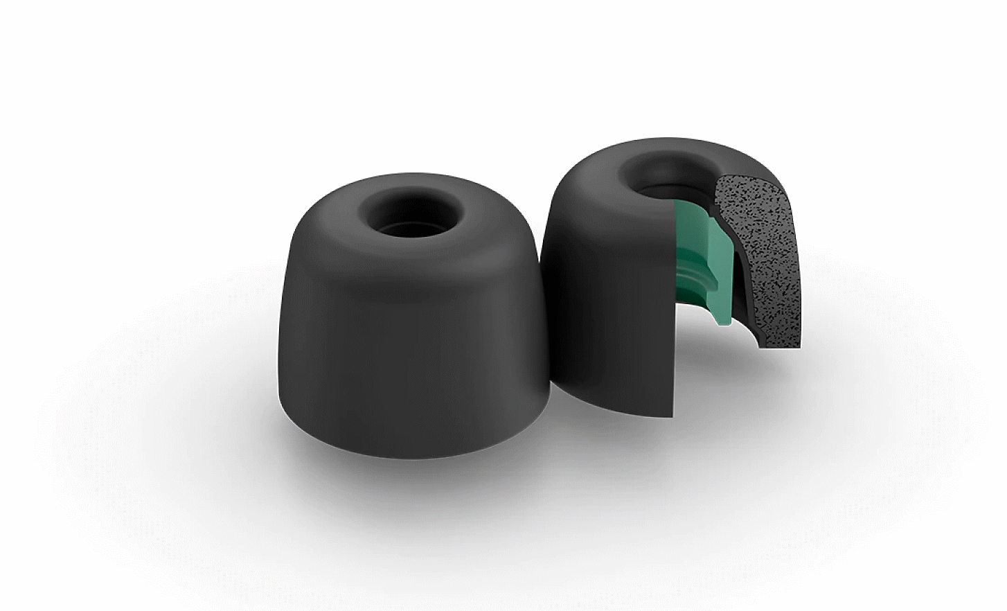 Et par EP-NI1000M-spidser til støjisolerende ørepuder, hvor en af dem er klippet væk for at vise den grønne indvendige del