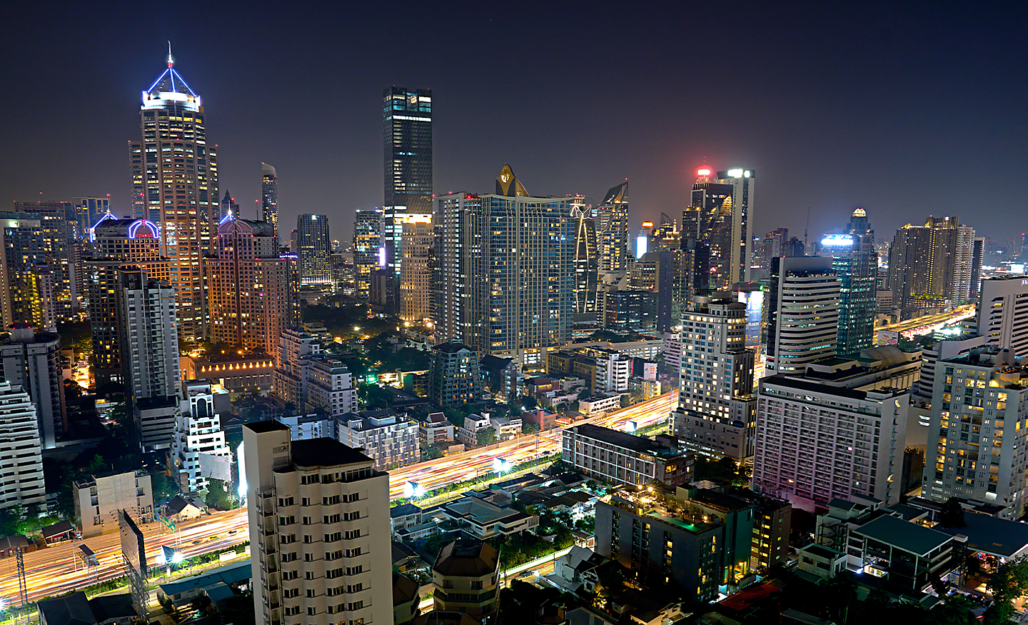 A cityscape at night, photographed from an elevated position 