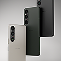 A staggered line-up of three Xperia V smartphones in Platinum Silver, Khaki Green and Black 