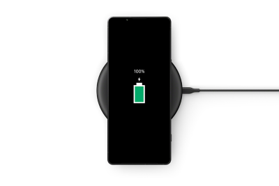An Xperia 1 V recharging on a wireless charger