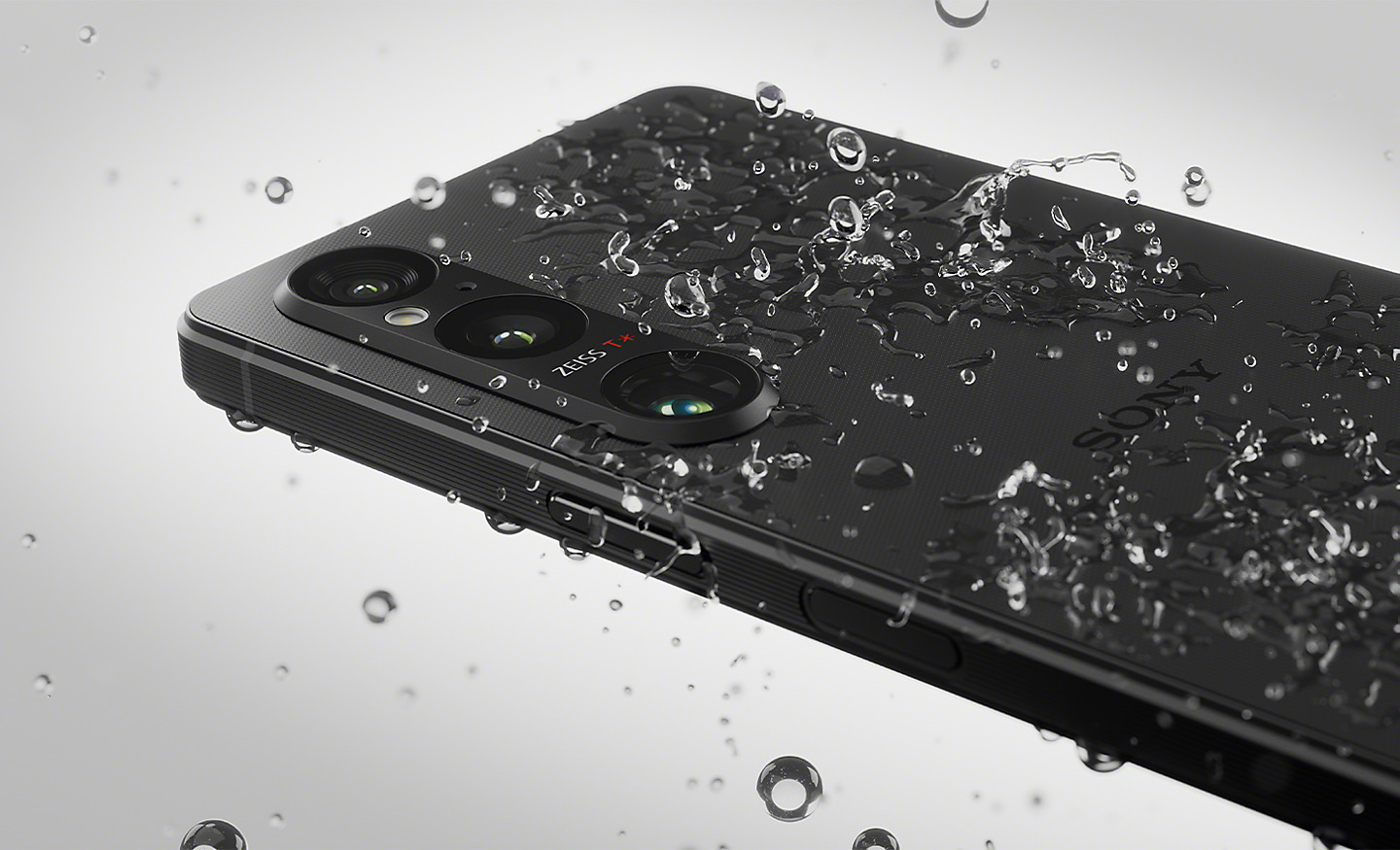 Droplets of water splashing onto the Xperia 1 V
