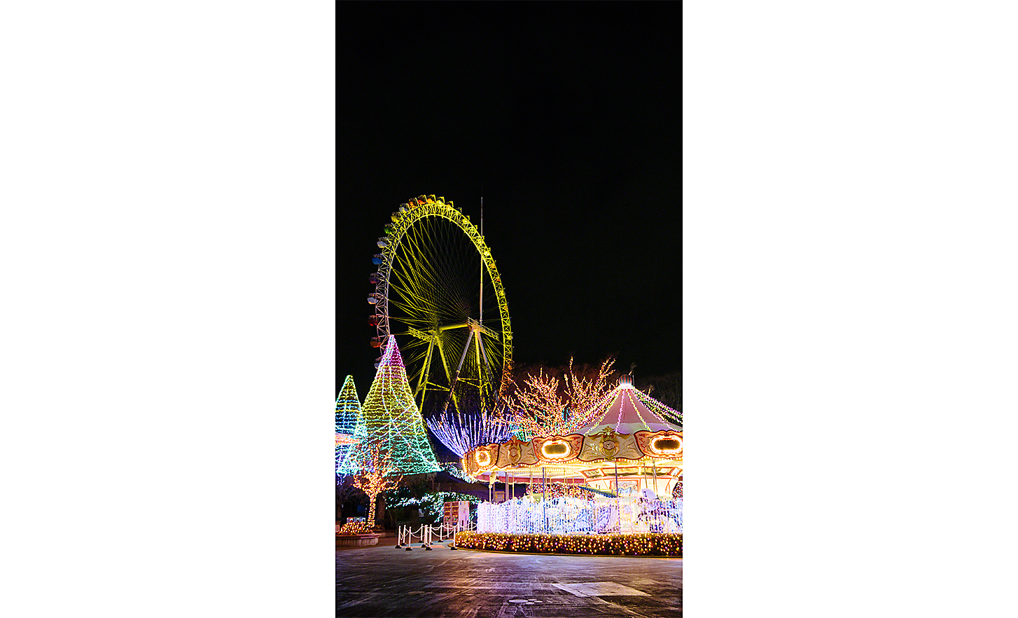 Image showing the colourful lights of a fairground at night