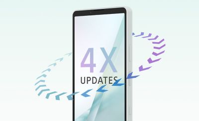 Smartphone con el texto "4 ACTUALIZACIONES" en pantalla, rodeado de flechas azules y moradas en bucle