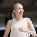 Image of a woman running in Sony Float Run headphones