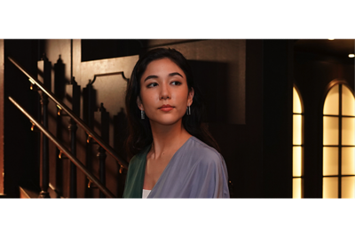 Example image of a portrait woman inside a building