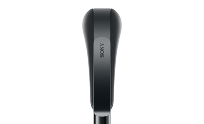 The top section of the headband from a pair of black 1000X THE COLLEXION headphones with cushioned padding 