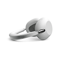 A pair of white 1000X THE COLLEXION headphones laid down so that the headband is on the ground