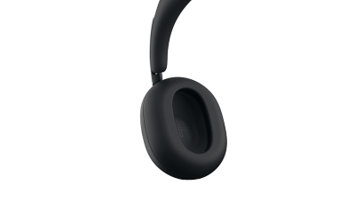 A close up of the interior of one ear cup from a pair of black 1000X THE COLLEXION headphones 