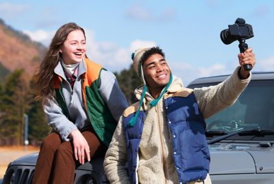 Image of a man and a woman taking a selfie together