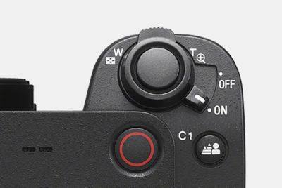 Ảnh cận cảnh cần gạt zoom trên thân máy ảnh