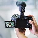 Photo of a video creator shooting with in-camera Active Mode image stabilisation, with no equipment other than the camera