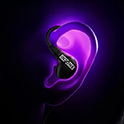 Silhouetted side profile wearing glowing purple INZONE E9.