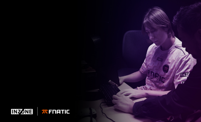 Fnatic esports players at an event with INZONE branding on screen.