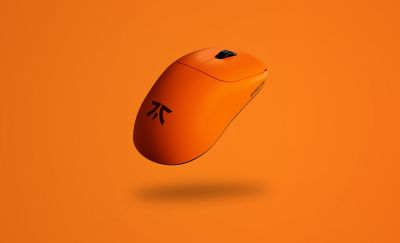 An orange mouse on an orange background