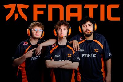 Three Fnatic esports players wearing orange INZONE H9 II Fnatic Edition headsets, Fnatic logo backdrop