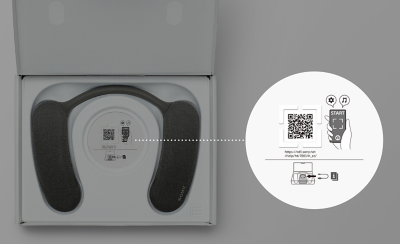 BRAVIA Theatre U in carton box with circular panel highlighted to right showing tactile dots surrounding a QR code for improved accessibility