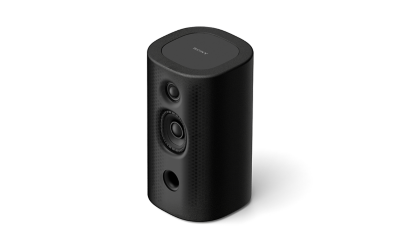 Gros plan sur une enceinte arrière bidirectionnelle.