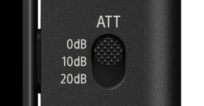 Close-up of the attenuation switch on the ECM-AX10 microphone, with textured slider next to 0dB, 10dB, and 20dB labels.