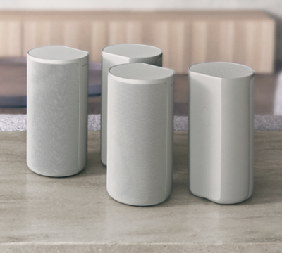 HT-A9 Home Theatre System speakers in a living room on a marble table