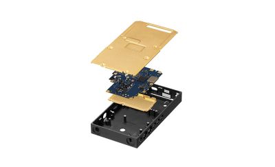 Explosion-view technical render of NW‑ZX900, revealing internal circuit boards and golden shielding components