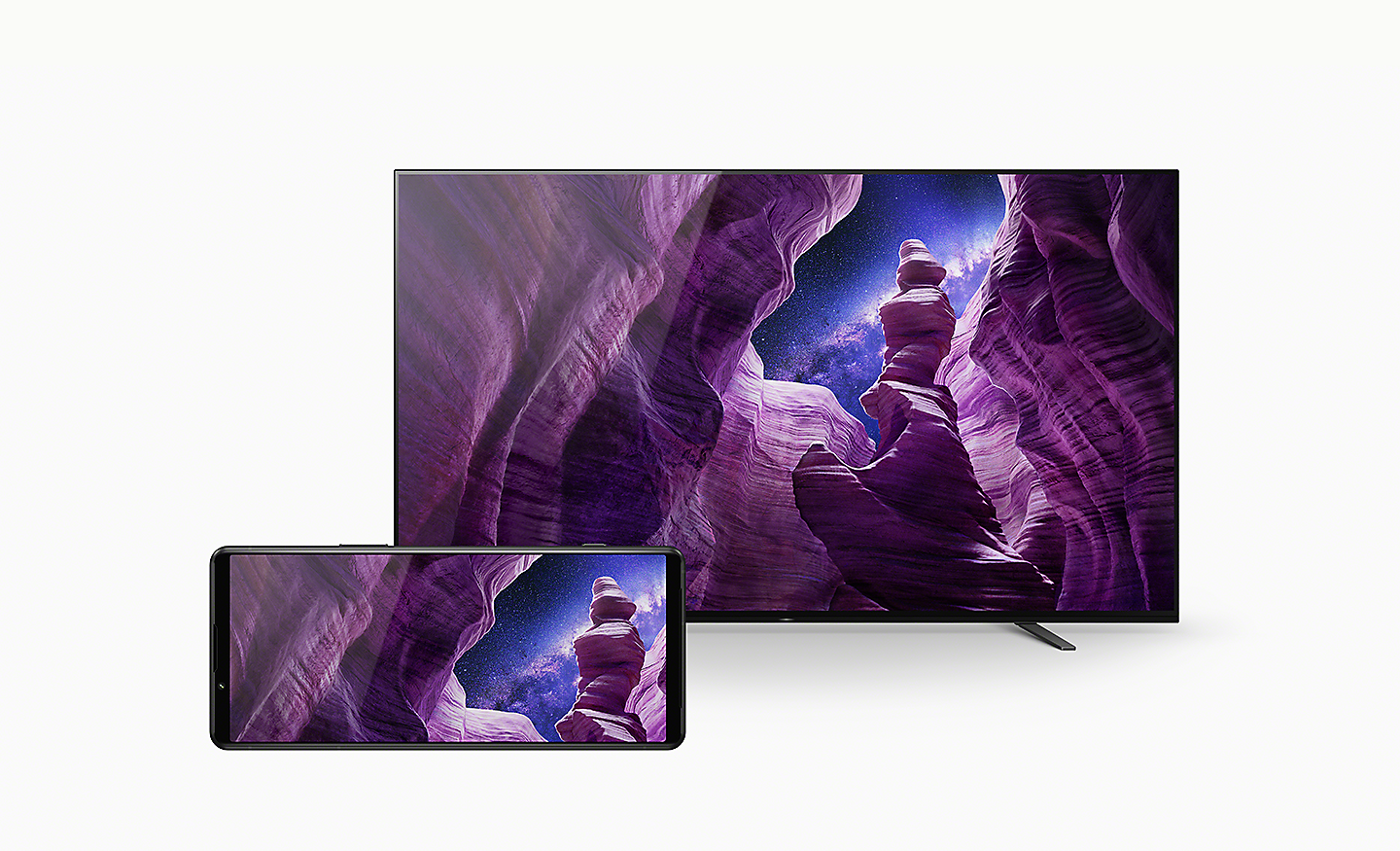 An Xperia 5 IV and a BRAVIA TV - both screens display the same image of dramatic rock formations