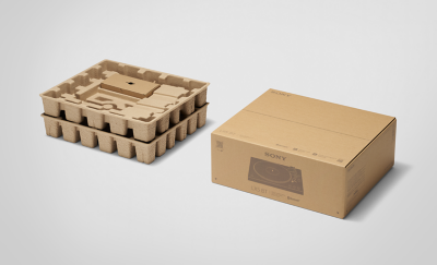 Verpackung des Plattenspielers, bei der Rücksicht auf die Umwelt im Vordergrund steht, hergestellt aus recyceltem Karton und Faserguss.