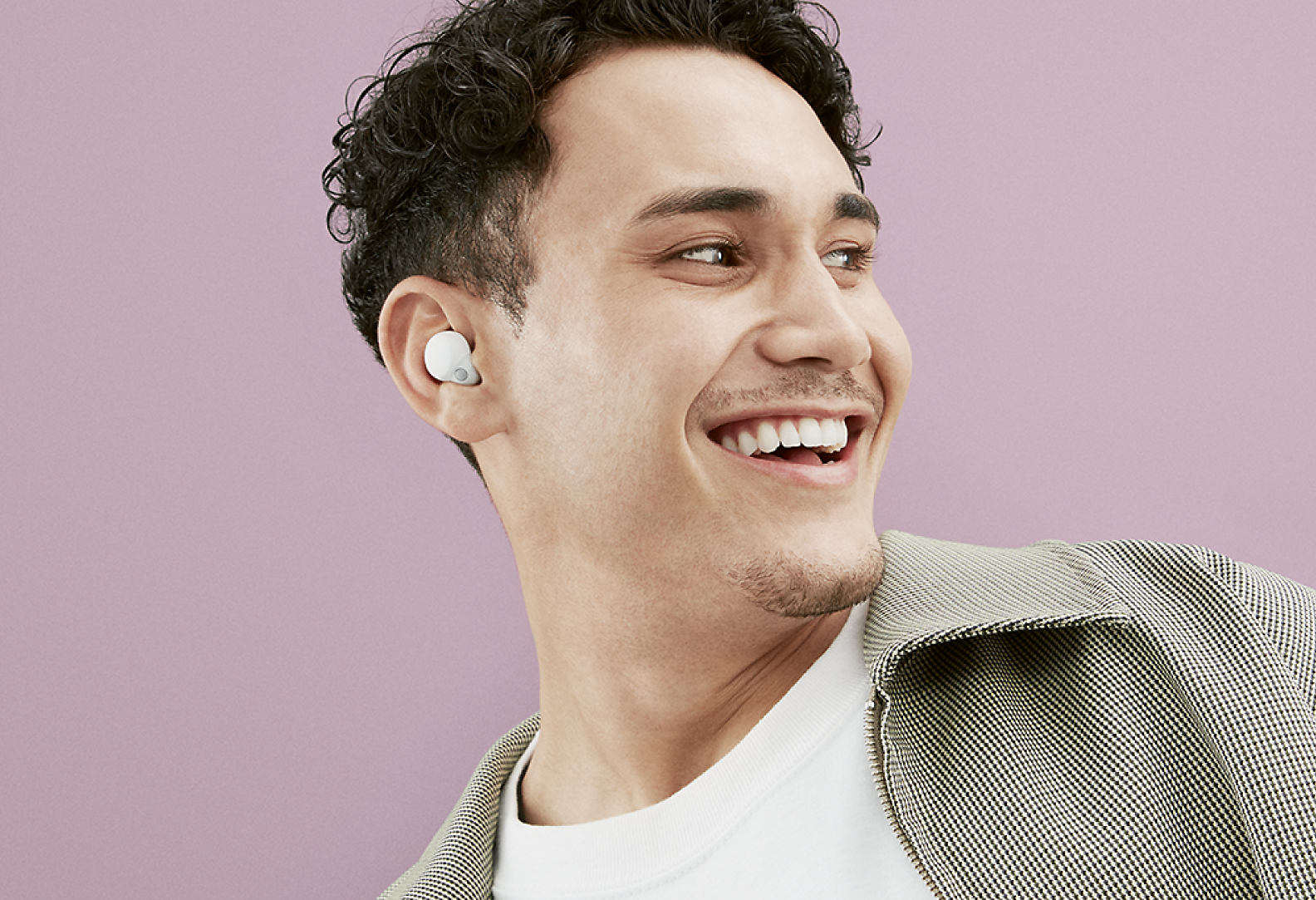 Image of a man wearing LinkBuds S inside a LinkBuds S earbud with two LinkBuds to the right