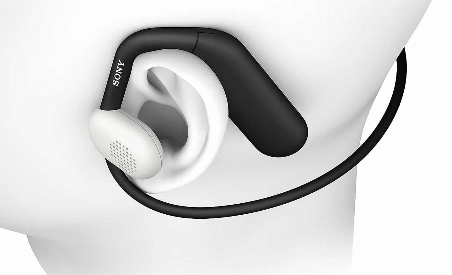 Side on image of a dummy head wearing the Sony Float Run headphones
