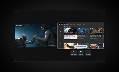 兩個螢幕，一個顯示《戰神：諸神黃昏》場景中的兩名戰士，另一個顯示 YouTube 遊戲影片的螢幕截圖
