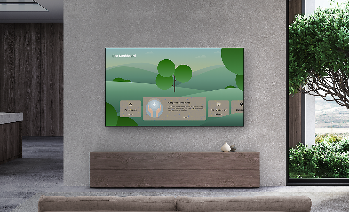 ห้องนั่งเล่นพร้อมทีวี BRAVIA แบบติดตั้งผนังที่แสดง Eco Dashboard บนหน้าจอ