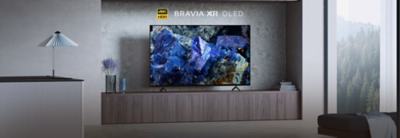 Téléviseur de la série A75L affichant les images éclatantes d’un cristal bleu dans un salon moderne, avec les logos 4K HDR, BRAVIA XR et OLED.