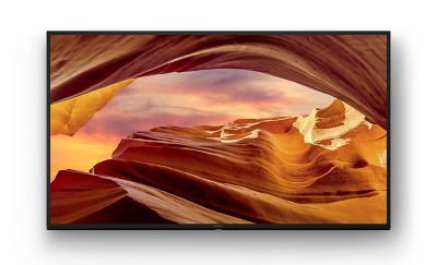 Front view of X70L Series BRAVIA TV on stand, displaying a spectacular rocky landscape